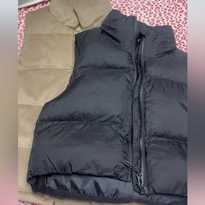 TWO puffer vest